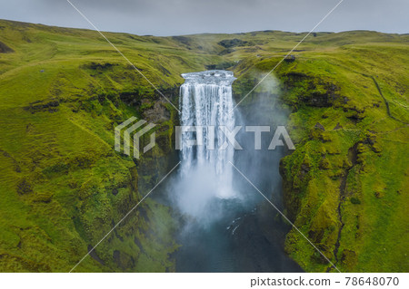 Iceland. Aerial view on the Skogafoss waterfall. Landscape in the Iceland from air. Famous place in Iceland. Landscape from drone. Travel concept Iceland. Aerial view on the Skogafoss waterfall. Landscape in the Iceland from air. Famous place in Iceland. Landscape from drone. Travel concept 78648070