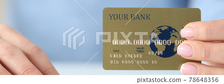 In woman's hand plastic credit bank card and keyboard 78648356