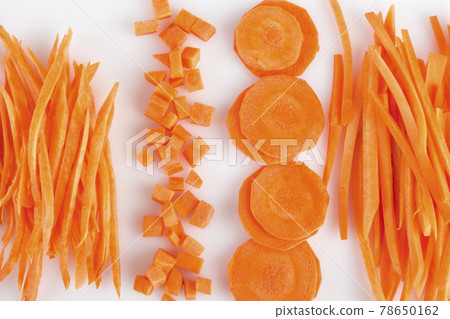 Fresh, sliced carrot on a white background. Fresh, sliced carrot on a white background. 78650162