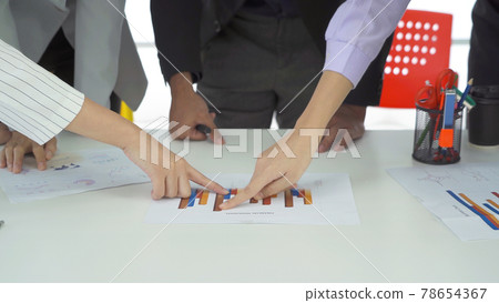 Group of business people meeting, communicate, discuss documents paperwork, and working in a meeting room in office seminar, present their ideas with colleagues. People lifestyle. Corporate teamwork Group of business people meeting, communicate, discuss documents paperwork, and working in a meeting room in office seminar, present their ideas with colleagues. People lifestyle. Corporate teamwork 78654367