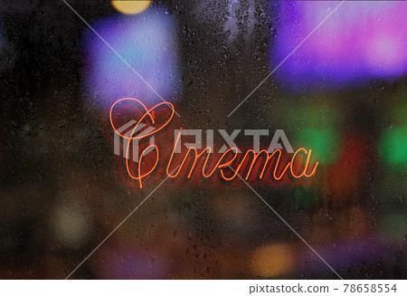 Vintage Red Neon Cinema Sign on Theater 78658554