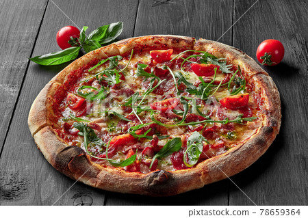 Pizza with pelati sauce, cabanossi, salami, bacon, ham Pizza with pelati sauce, cabanossi, salami, bacon, ham 78659364
