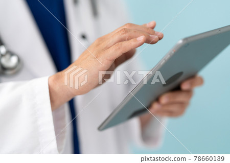 Doctor middle man white coat scrub tablet hand 78660189