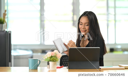 Business female working online while video calling on freelance meeting. 78660646