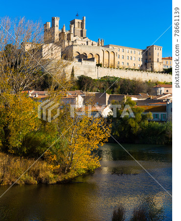 Cathedral of Saint Nazaire across Orb river Cathedral of Saint Nazaire across Orb river 78661139