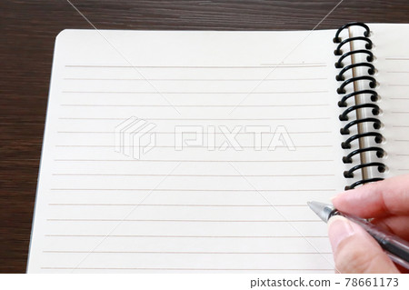Writing in a notebook 4 Writing in a notebook 4 78661173
