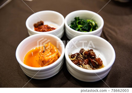 Ttukbaegi Bulgogi, Korean traditional food, boiled with beef, mushrooms, green onions, and vegetables in a pot. Ttukbaegi Bulgogi, Korean traditional food, boiled with beef, mushrooms, green onions, and vegetables in a pot. 78662003