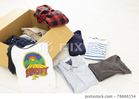 Cardboard and clothes 78668154