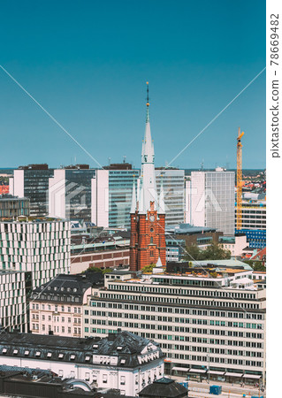 Stockholm, Sweden. Elevated View Of St. Clara Or Saint Klara Church In Summer Sunny Modern Cityscape Skyline. Stockholm, Sweden. Elevated View Of St. Clara Or Saint Klara Church In Summer Sunny Modern Cityscape Skyline. 78669482