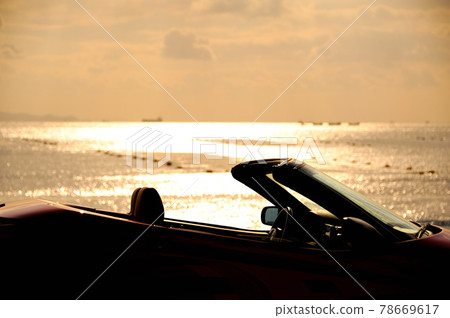 Twilight sea and convertible 78669617