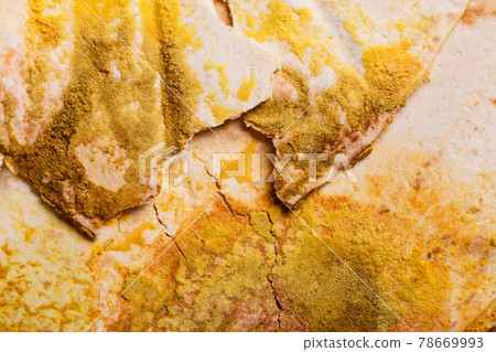 Mouldy growth on flat bread. Mouldy growth on flat bread. 78669993