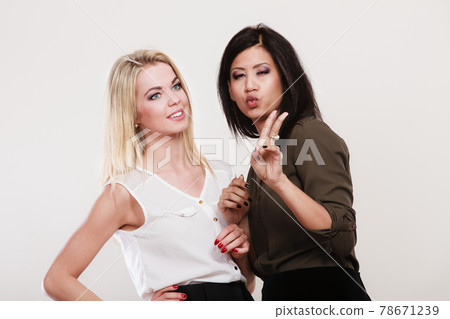 Women multiracial friends having fun Women multiracial friends having fun 78671239