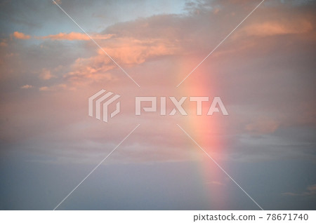 Rainbow in the sky at evening Rainbow in the sky at evening 78671740