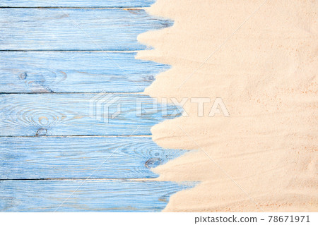 Summer background from sea sand and blue wooden planks. Top view with copy space 78671971