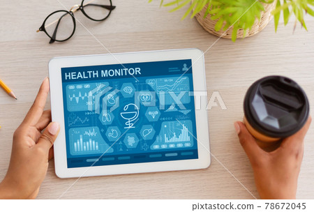 Above view black woman using personal tablet at cafe 78672045