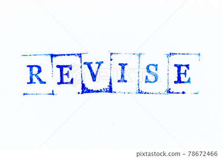 Blue color ink rubber stamp in word revise on white paper background 78672466