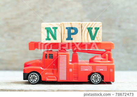 Fire ladder truck hold letter block in word NPV (Abbreviation of net present value) on wood background Fire ladder truck hold letter block in word NPV (Abbreviation of net present value) on wood background 78672473