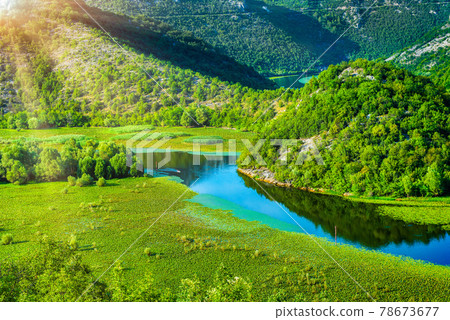 Lake in high mountains Lake in high mountains 78673677