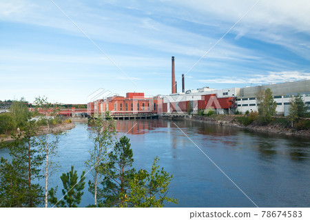 Autumn landscape of Kymijoki river waters and Myllykoski factory in Finland, Kymenlaakso, Kouvola. Autumn landscape of Kymijoki river waters and Myllykoski factory in Finland, Kymenlaakso, Kouvola. 78674583