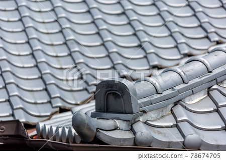 Deterioration of tiled roof 78674705