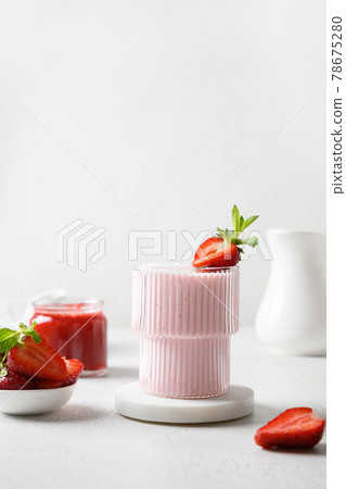 Indian strawberry lassi or milkshake on white background 78675280