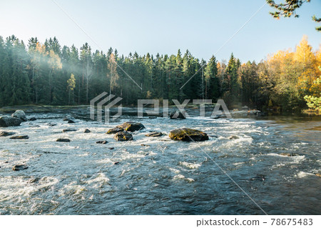 Beautiful autumn landscape on river Kymijoki near the Emperor Alexander lll fishing lodge Langinkoski. Kotka, Finland Beautiful autumn landscape on river Kymijoki near the Emperor Alexander lll fishing lodge Langinkoski. Kotka, Finland 78675483
