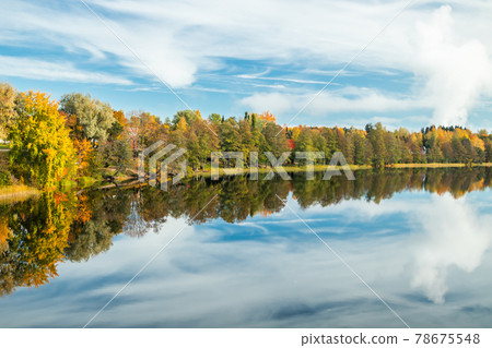 Beautiful autumn landscape of Kymijoki river waters in Kuusankoski. Finland, Kymenlaakso, Kouvola Beautiful autumn landscape of Kymijoki river waters in Kuusankoski. Finland, Kymenlaakso, Kouvola 78675548