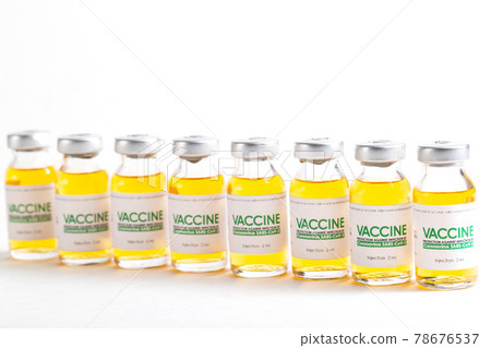 Looped. Flasks of vaccine for COVID-19 coronavirus in research lab. Vaccination, injection, clinical trial during pandemic, macro 78676537