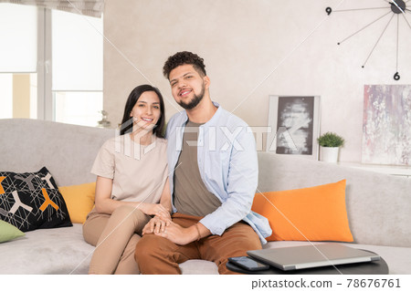 Affectionate couple having rest in home environemnt Affectionate couple having rest in home environemnt 78676761