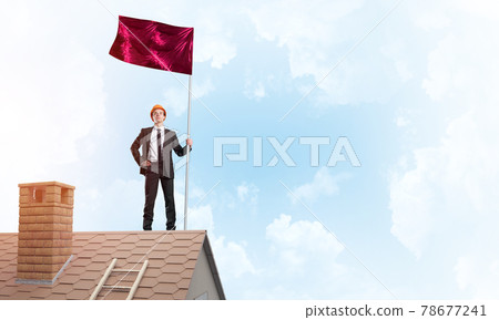 Young businessman with flag presenting concept of leadership. Mixed media Young businessman with flag presenting concept of leadership. Mixed media 78677241