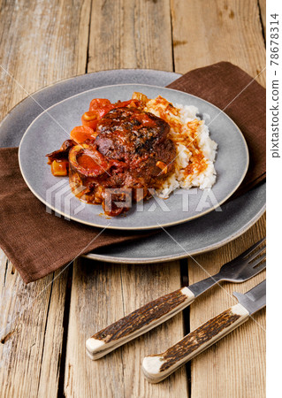Overhead view of plate with ossobuco Overhead view of plate with ossobuco 78678314