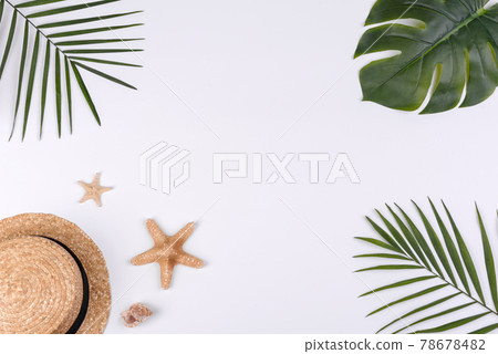 Beach accessories: glasses and hat with shells and sea stars on a white background 78678482