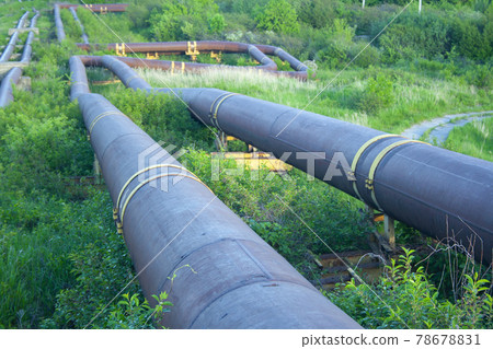 sewer pipes on a hillside draining waste sewer pipes on a hillside draining waste 78678831