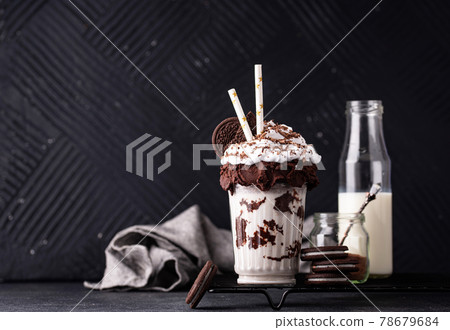 Sweet milkshake with whipped cream Sweet milkshake with whipped cream 78679684