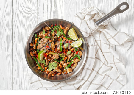 Thai cashew chicken stir fry in a pan 78680110