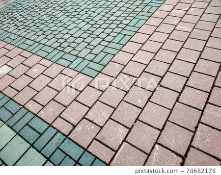 Stone pavement in perspective. Granite cobblestone pavement tiles. Stone pavement in perspective. Granite cobblestone pavement tiles. 78682178