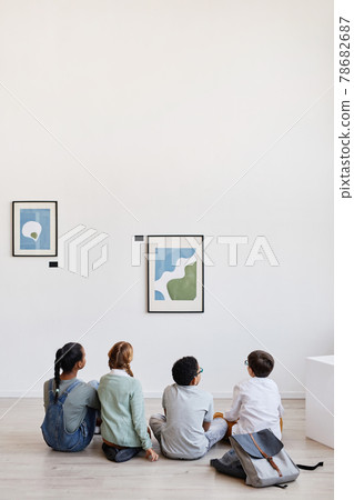 Kids Looking at Painting in Gallery 78682687