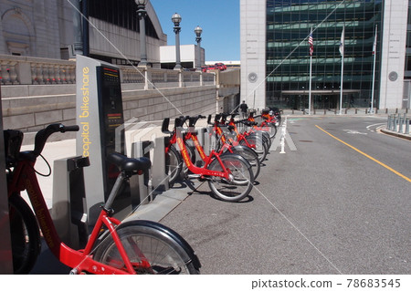 Red share bikes parked in Washington DC Red share bikes parked in Washington DC 78683545
