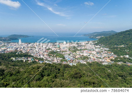 Aerial view blue ocean and blue sky with mountain in the foreground at Patong Bay of Phuket Thailand Landscape of patong city phuket in sunny summer day time Beautiful tropical sea High angle view Aerial view blue ocean and blue sky with mountain in the foreground at Patong Bay of Phuket Thailand Landscape of patong city phuket in sunny summer day time Beautiful tropical sea High angle view 78684074