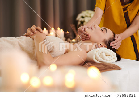 Young woman getting spa procedure Young woman getting spa procedure 78688821