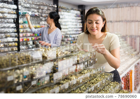 Portrait of woman shopping in jewelry store Portrait of woman shopping in jewelry store 78690060