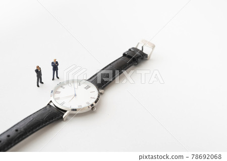 Wristwatch and businessman-style miniature doll 78692068