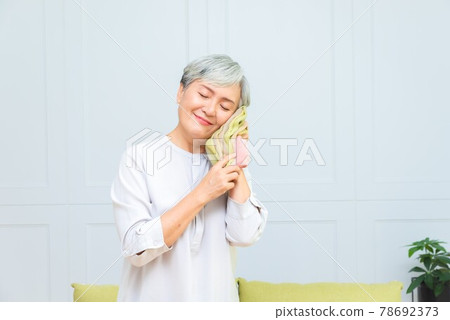 Fashion portrait of silver-haired woman Fashion portrait of silver-haired woman 78692373
