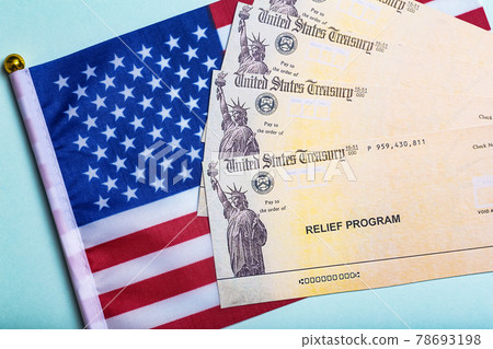 USA dollars background. American rescue plan, USA relief program, stimulus check and Act of 2021 concept. Money, business, profit and livelihood idea USA dollars background. American rescue plan, USA relief program, stimulus check and Act of 2021 concept. Money, business, profit and livelihood idea 78693198