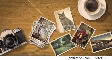Old photos lined up on an antique table. Angle from directly above Old photos lined up on an antique table. Angle from directly above 78694663