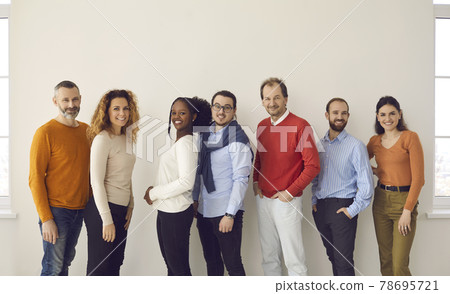 Diverse casual people team different age and nationality posing for camera Diverse casual people team different age and nationality posing for camera 78695721