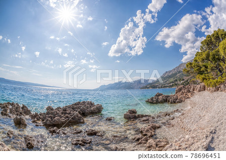 Amazing Croatian beaches against sunset in Brela, Dalmatia, Croatia 78696451