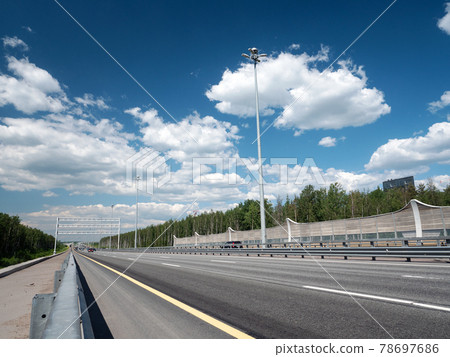 Asphalt ringroad ZSD. Speedway with cars around Saint-Petersburg, Russia Asphalt ringroad ZSD. Speedway with cars around Saint-Petersburg, Russia 78697686