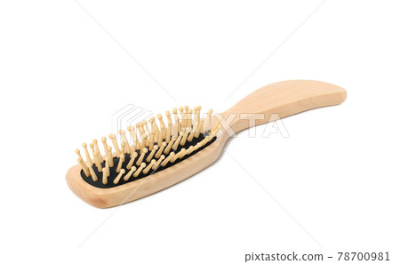 wooden hair comb isolated on white background wooden hair comb isolated on white background 78700981