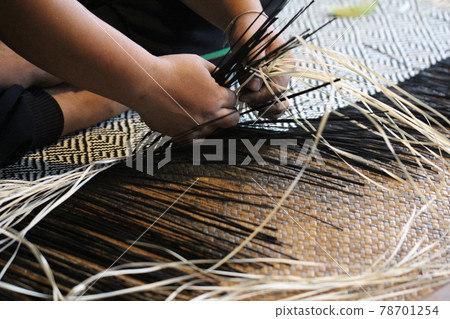 Close-up image of asian female hands tailor manual working sewing crafting at textile factory, advertisement backgrounds 78701254